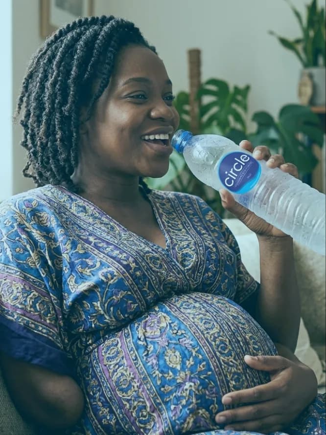 Pregnant woman enjoying fresh water